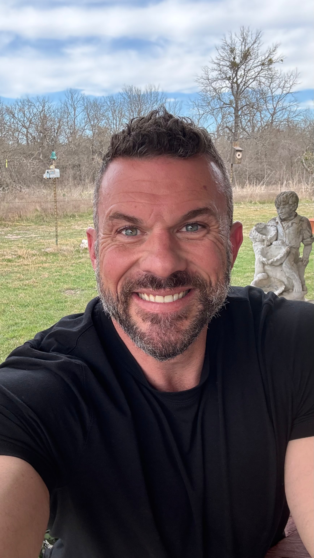 Chad Vermillion, natural outdoor portrait with a relaxed smile